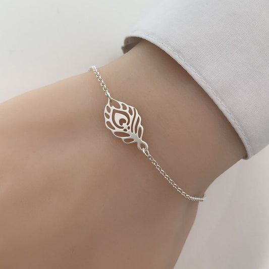 Forever Rakhi Bracelet for Brother – Elegant Peacock Feather Rakhi for Men