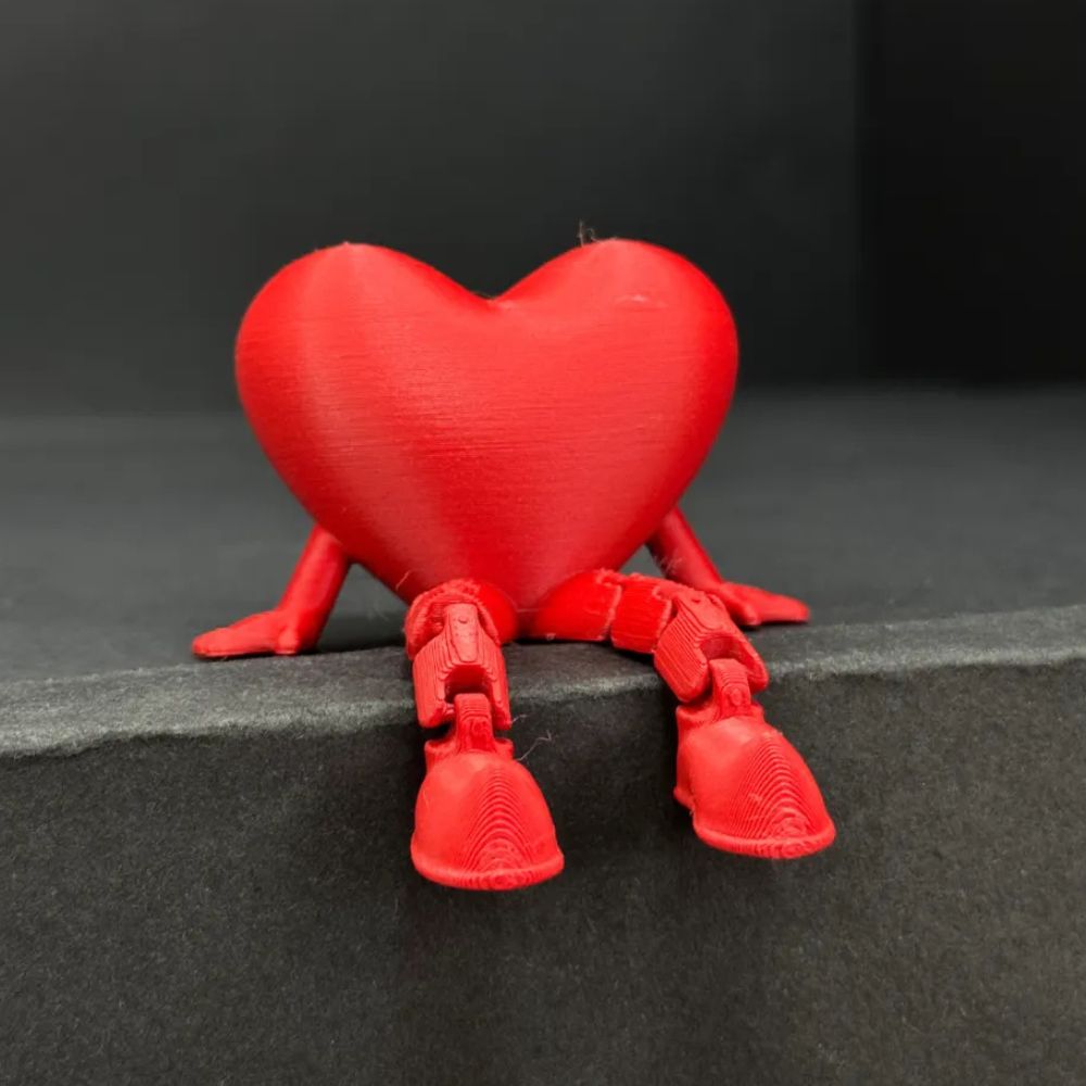 3D Articulated Heart Showpiece with Dangling Legs – Valentine’s Day Gift (7–8 cm)