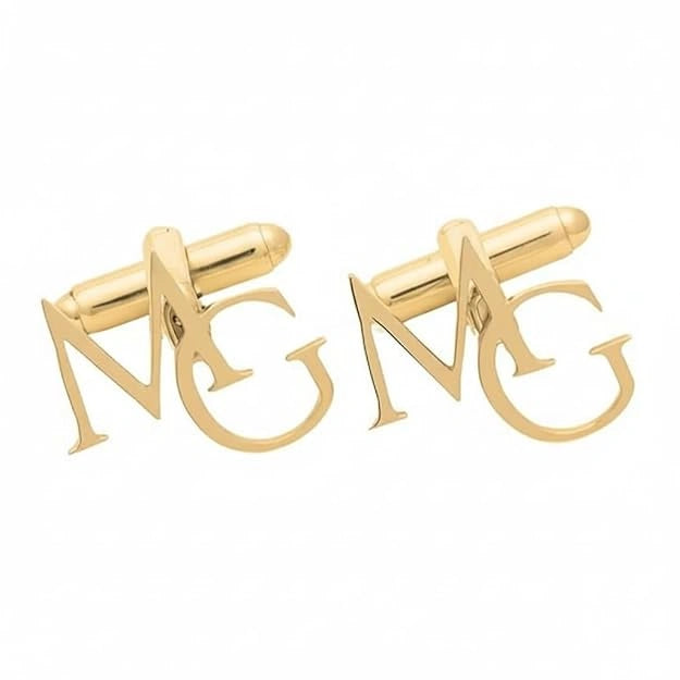 Custom gold monogram cufflinks with letters M and G for men's formal shirts.