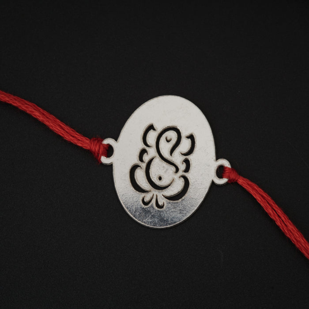 Moskai Lord Ganesha Rakhi with Red Thread | Elegant Ganpati Design Rakhi for Brother