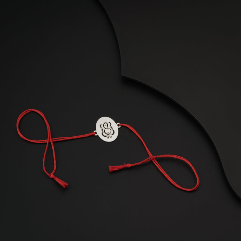 Moskai Lord Ganesha Rakhi with Red Thread | Elegant Ganpati Design Rakhi for Brother