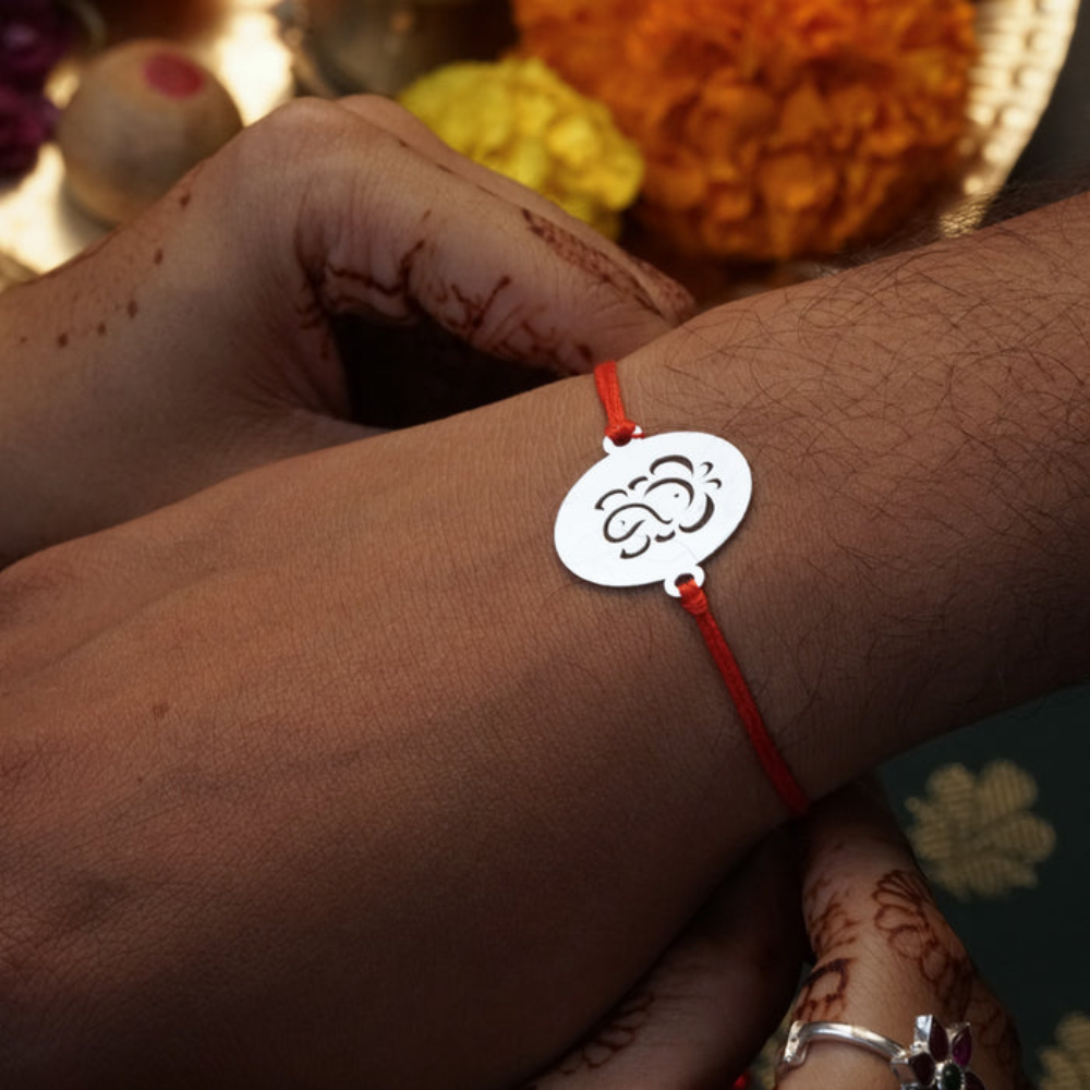 Moskai Lord Ganesha Rakhi with Red Thread | Elegant Ganpati Design Rakhi for Brother