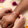 Custom Alphabet Rakhi in Hindi Style with Red Thread by Moskai